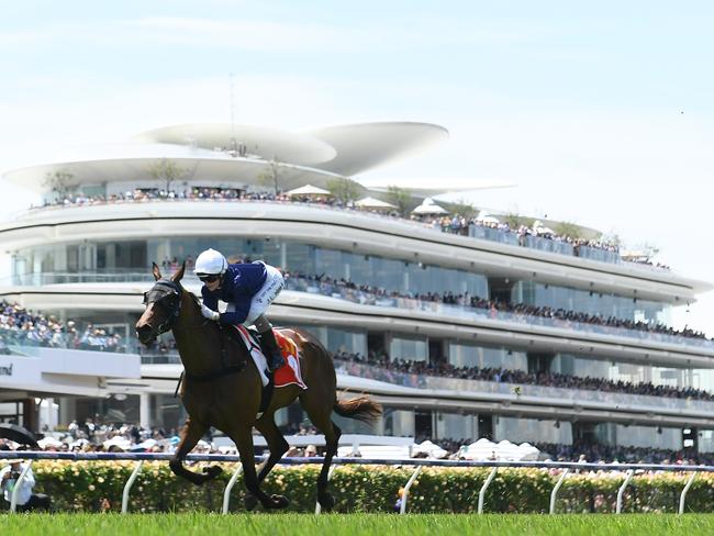 Jamie Kah guides The Map to a dominant win at Flemington on Melbourne Cup day. Picture: Quinn Rooney-Getty Images