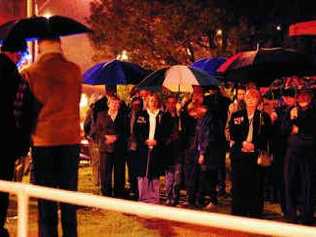 A shower of rain at the Maclean Anzac Day dawn service was always on the cards as part of the sodden start to 2011. . Picture: Adam Hourigan