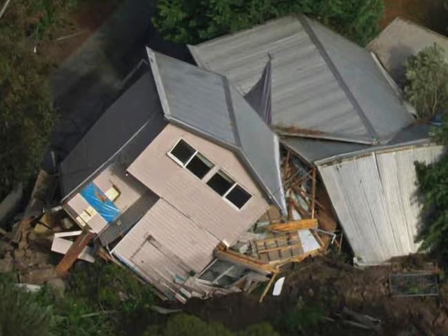 A person has been injured after a house toppled over during an apparent landslide in regional Victoria. Emergency services were called to a property on View Point Rd in McCrae on the Mornington Peninsula - about 59km south of Melbourne - about 8.45am Tuesday after a landslide caused the building to topple over. Picture: ABC