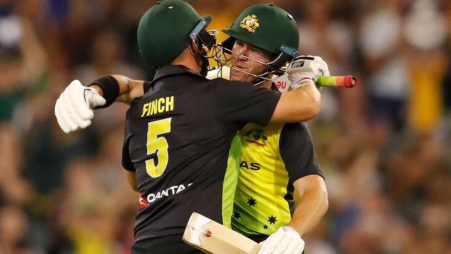 MELBOURNE, AUSTRALIA - FEBRUARY 10:  Aaron Finch and D'Arcy Short of Australia celebrate after hitting the winning runs during game two of the International Twenty20 series between Australia and England at Melbourne Cricket Ground on February 10, 2018 in Melbourne, Australia.  (Photo by Scott Barbour/Getty Images)