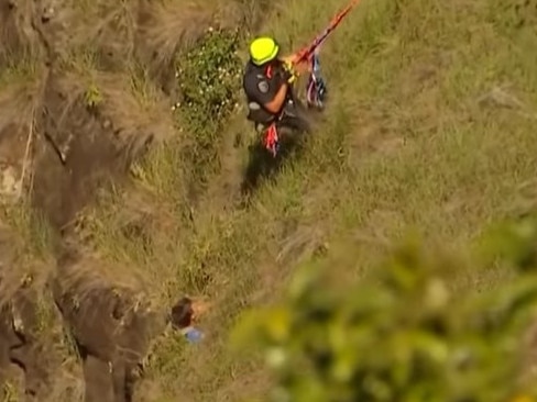 A 19-year-old has been winched to safety after he found himself caught in a precarious position during a Boxing Day climb. Picture: 7 News