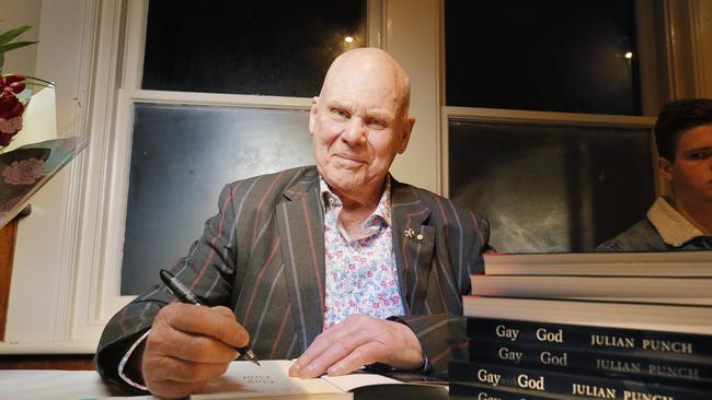 Julian Punch signing copies of his book, Gay with God: The Life and Times of a Turbulent Priest, at the launch event at the SoHo Hotel. Picture: MATHEW FARRELL