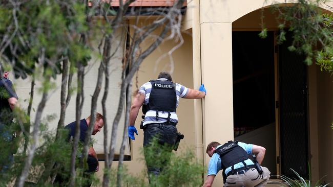 Police at the scene at Kumnick Street, Upper Coomera where there was a shooting last night involving alleged Rebels bikie Gokhan Turkyilmaz. Pics Adam Head