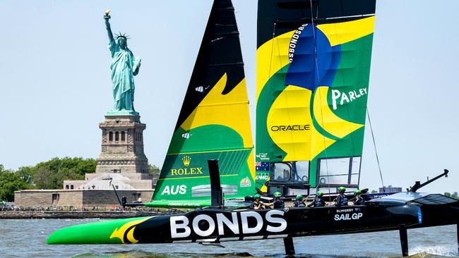 Australia's BONDS Flying Roos sailing in front of the Statue of the Liberty. Photo: SailGP/Supplied.