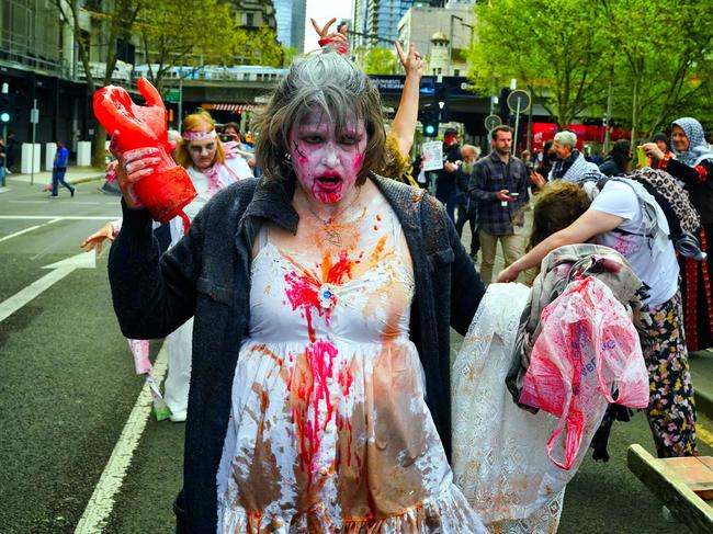 Protesters take part in a bizarre ‘zombie rave’ to try and disrupt the expo. Picture: NewsWire