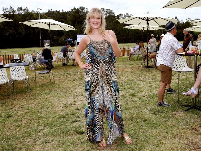 Sarah using the Going to the Polo at Avalon's Hitchcock Park app. Or maybe just Sarah at the polo. And in a lovely frock. Picture: Annika Enderborg