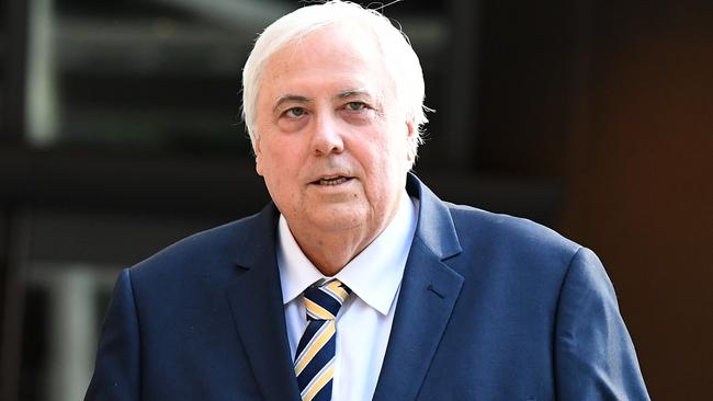 Clive Palmer leaves the Federal Court in Brisbane.