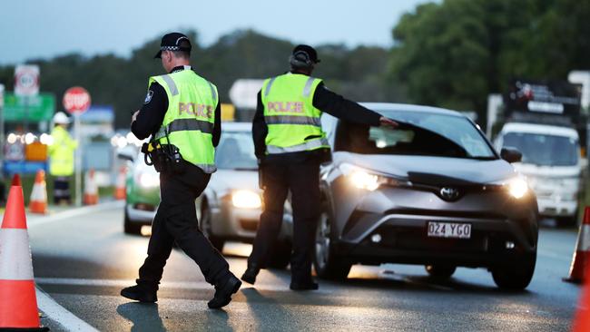 Police checking cars as they cross the border. Picture: Nigel Hallett