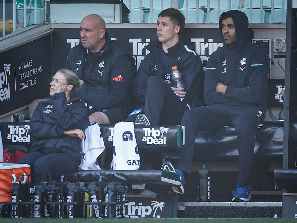 Lachie Fogarty and Jack Martin after being injured early in the game against Hawthorn. Picture: Michael Willson/AFL Photos via Getty Images.