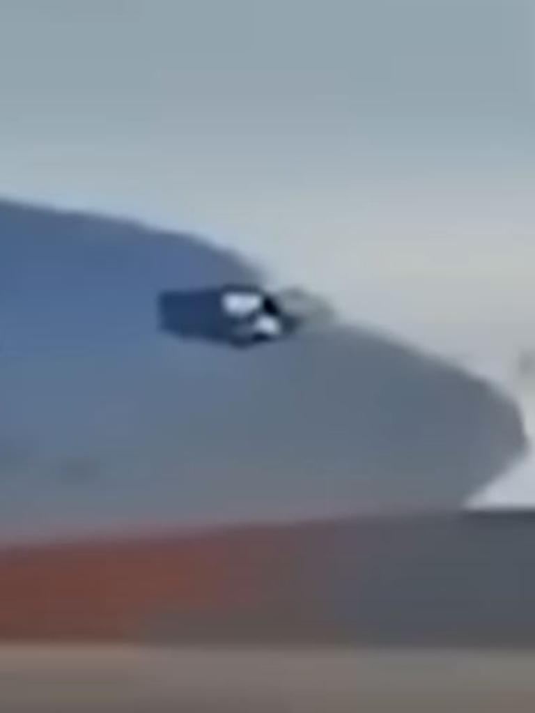 It shows a pilot's arm outstretched in the cockpit. Picture: YouTube