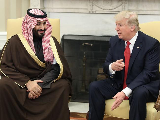 U.S. President Donald Trump, speaks with Mohammed bin Salman, the Kingdom of Saudi Arabia's deputy crown prince and minister of defense, left, in the Oval Office of the White House in Washington, D.C., U.S., on Tuesday, March 14, 2017. Trump's administration may resume selling weapon guidance systems to Saudi Arabia that was halted by former President Barack Obama in December, according to the Wall Street Journal. Photographer: Mark Wilson/Pool via Bloomberg