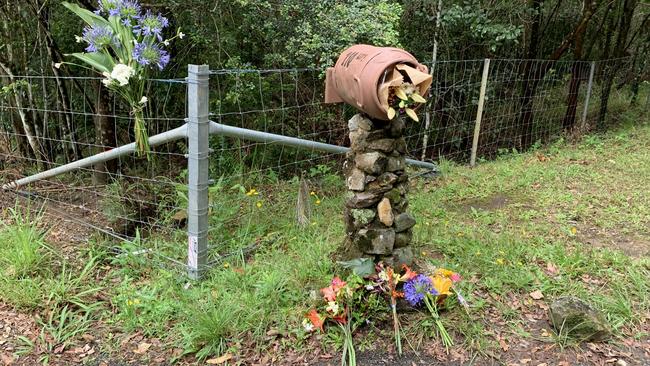 Flowers have been left at the entrance to a Goonengerry property where twin girls died on Sunday. Picture: Cath Piltz