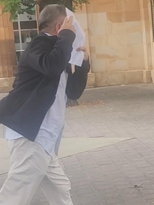 Ali Hazara sprinted from the courthouse after being sentenced. Photo: Lucy Rutherford