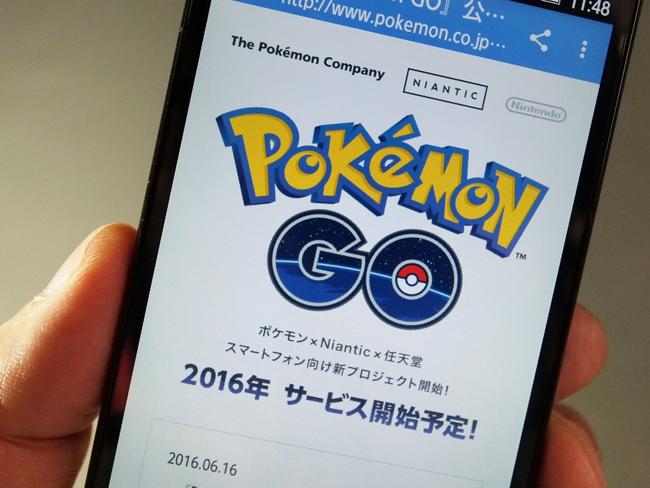 This photo illustration taken in Tokyo on July 13, 2016 shows the Pokemon official site through a Japanese internet website announcing the latest information for "Pokémon GO". With Pokemon-mania sweeping the planet, Nintendo's nascent shift into mobile gaming has proved a massive hit, vindicating the Japanese videogame giant's decision to unshackle itself from a long-standing consoles-only policy. / AFP PHOTO / KAZUHIRO NOGI / TO GO WITH Japan-US-IT-Nintendo-Pokemon-lifestyle,FOCUS by Harumi OZAWA