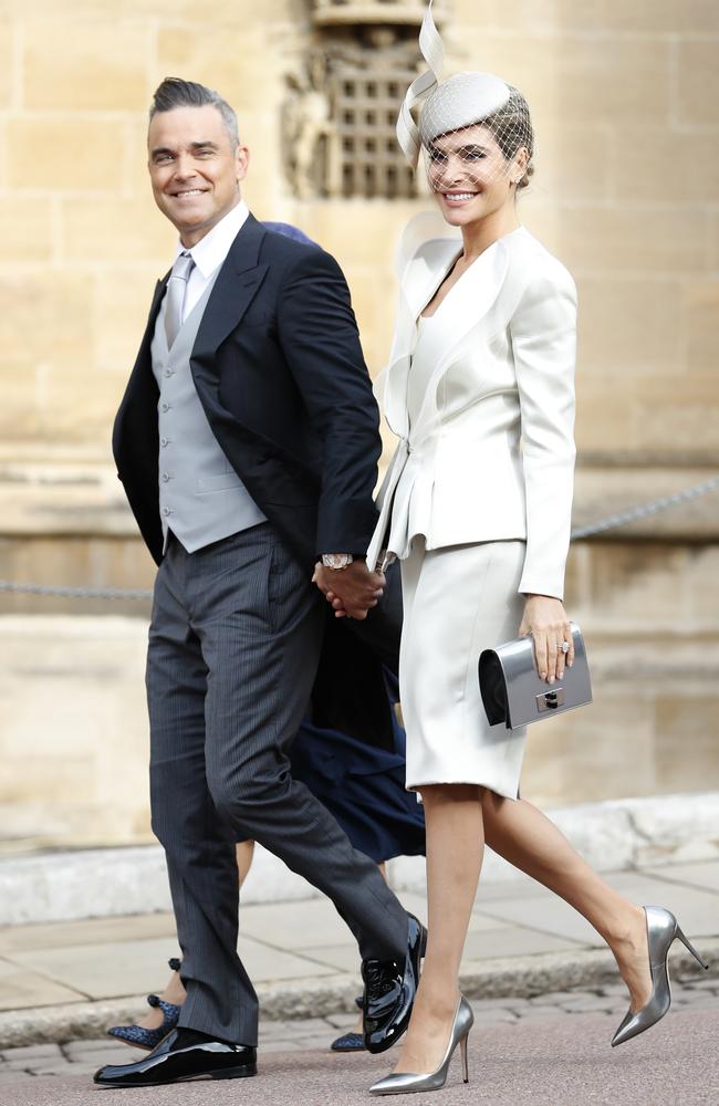 Robbie Williams and Ayda Field are close friends with Princess Eugenie and her longtime partner, Jack Brooksbank. Credit: AP Photo/Alastair Grant, Pool