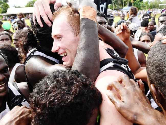 Magpies players celebrate their win over Tapalinga. Picture: Elise Derwin.