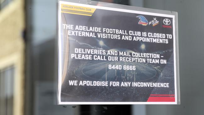 Sign on the door of the Adelaide Football Club. Picture: Sarah Reed.