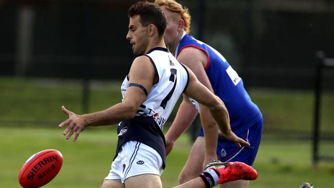 Sam Lloyd in action for Bundoora. Picture: Stuart Milligan