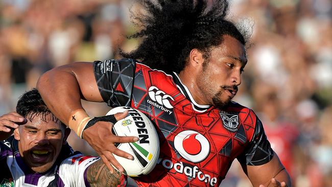 Warriors player Iulio Afoa on the charge against the Storm.