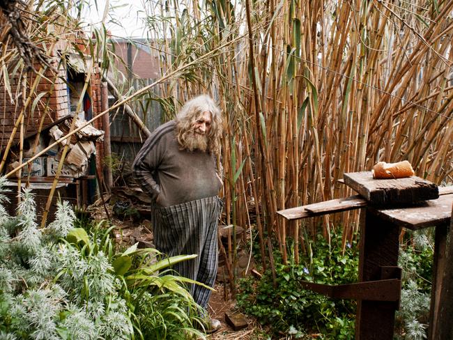 Royce Wells in the yard of the House of Psychedelia. Picture: Alex Frayne