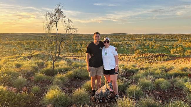 Canteen Creek School teacher Skye Cossich (pictured with partner Kyle and dog Winnie) participated in the Department of Education's graduate teacher pilot program.