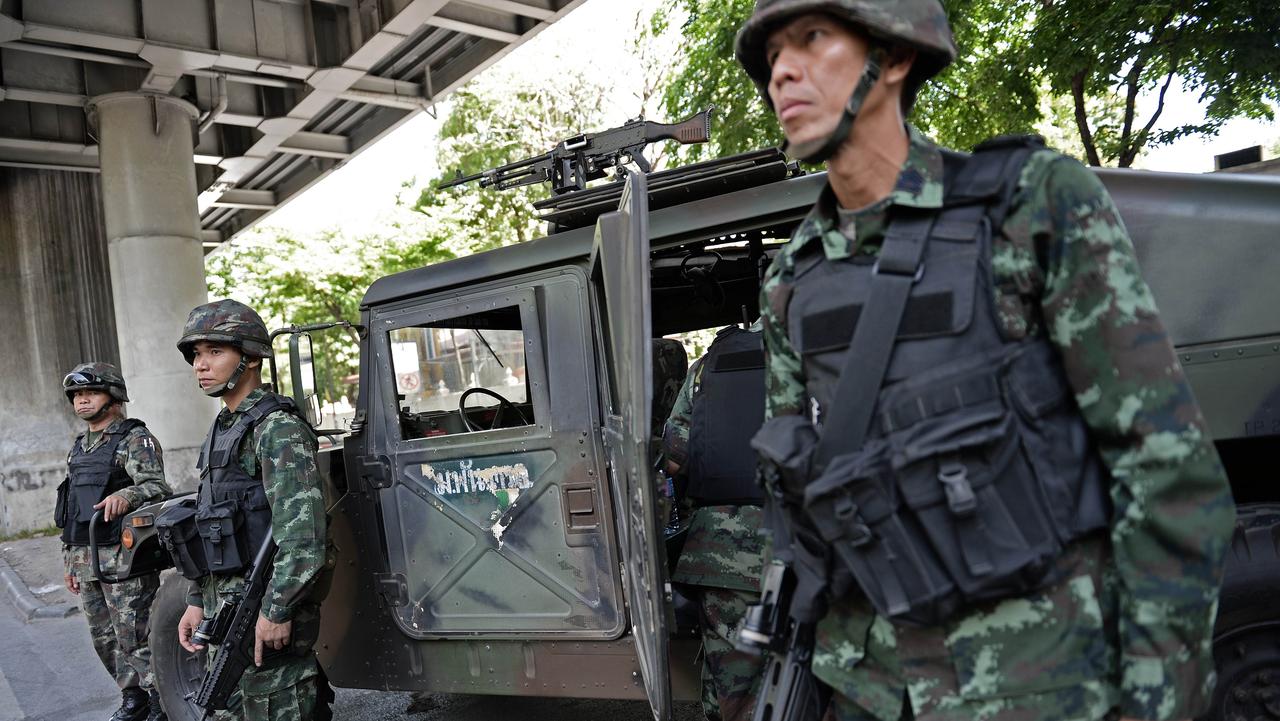 Soldiers secure an area in front of the Royal Thai Police headquarters in Bangko. Picture: AFP