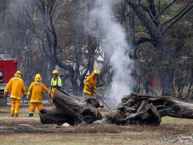 CFA and Forestry and others work to mop up spotfires at the foot of the Grampians National Park. Picture: Jason Edwards