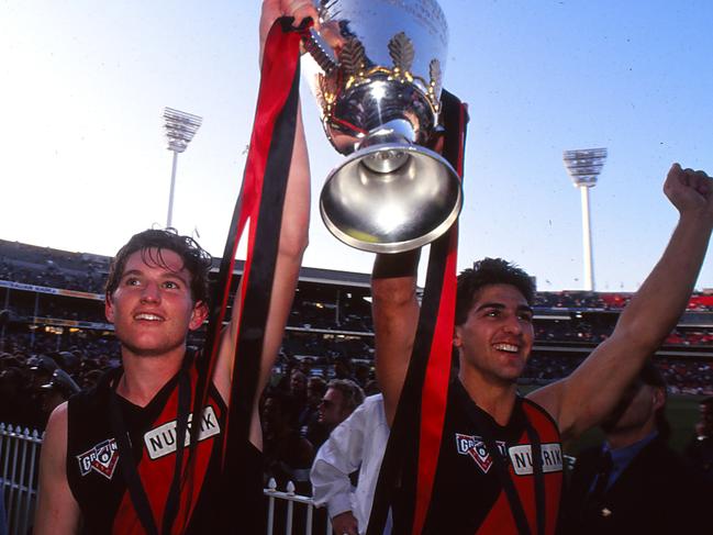 Rick Olarenshaw pictured next to James Hird as the Bombers celebrate winning the 1993 AFL Grand Final. Picture: Getty Images