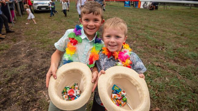 Levi, 6 and Darcy, 5 after the lolly drop. Picture: Jason Edwards