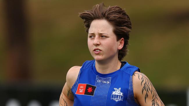 MELBOURNE, AUSTRALIA - NOVEMBER 27: Tess Craven of the Kangaroos trains away from the main group during a North Melbourne Tasmanian Kangaroos Training Session at Arden Street Ground on November 27, 2024 in Melbourne, Australia. (Photo by Morgan Hancock/Getty Images)