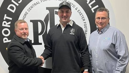 Port District coach Josh Ramsey (middle) was thrilled with his side’s close win over SPOC. Picture: Port District Football Club