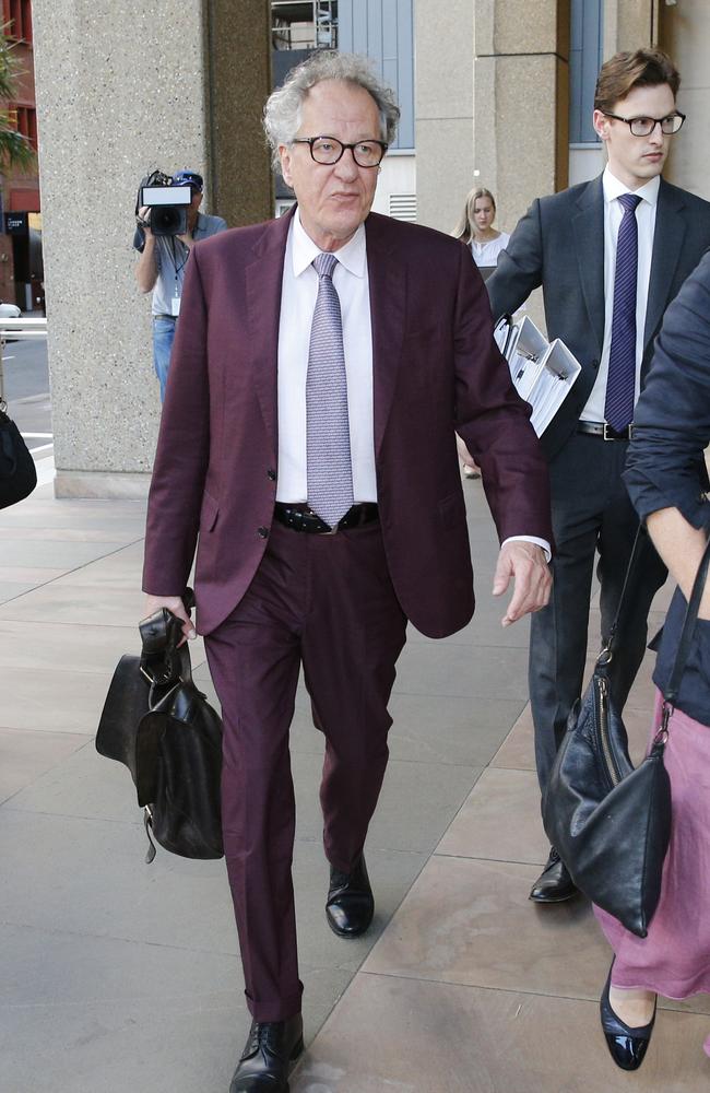 Geoffrey Rush arrives at court. Picture: Richard Dobson