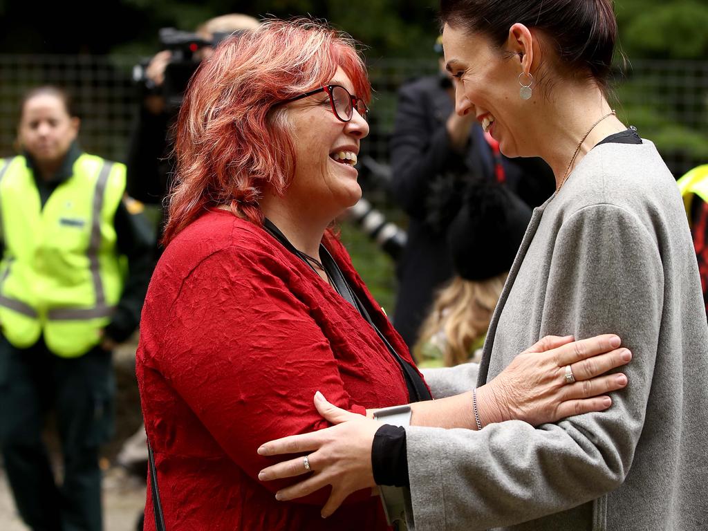 The ring spotted on Friday: Anna Osborne from the Family Reference Group embraces Ms Ardern at the entrance to the Pike River Mine in Greymouth, New Zealand. Picture: Phil Walter/Getty Images