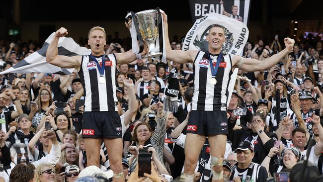 Billy Frampton and Darcy Cameron celebrate with the Magpie fans. Picture: Getty Images