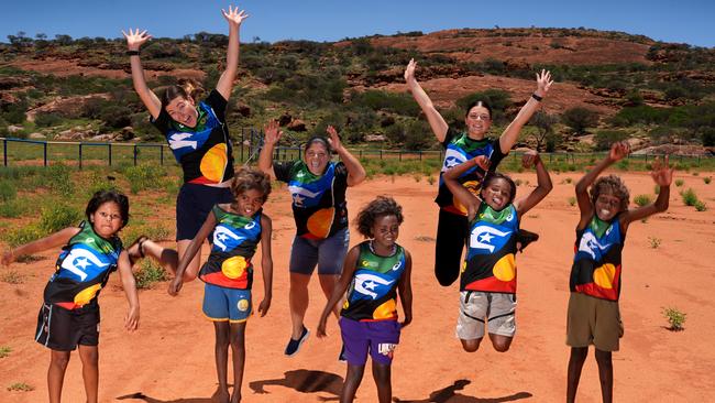 Mimili run and walk club members Brooke Webb, Jemma O’Rourke and Ella Hadley, rear, with Dakota, 6, Leslie, 7, Natannia, 10, Jessie, 10, and Alex, 10. Picture: Dean Martin