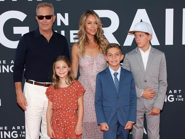 The couple in 2019 with their three children Cayden, 15, Hayes, 14, and daughter Grace, 12. Picture: Phillip Faraone/Getty Images