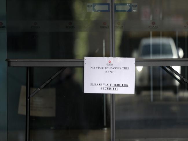 A sign on the door of Rydges Hotel during hotel quarantine. Picture: Sarah Matray