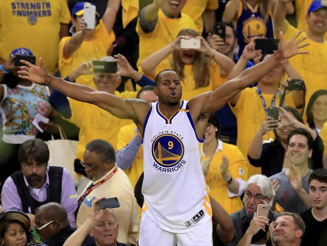 Andre Iguodala soaks up the love from the crowd after beating the Cavs. Picture: Getty Images/AFP