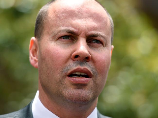 Federal Treasurer Josh Frydenberg speaks at a doorstop during a visit to Riverside Girls High School in Sydney, Tuesday, November 13, 2018. (AAP Image/Joel Carrett) NO ARCHIVING