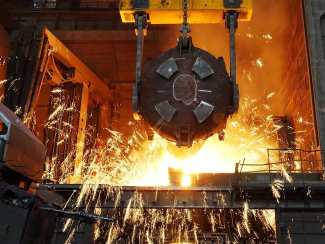 A worker works at a furnace at a steel plant in Dalian, China, earlier this month. PHOTO: REUTERS