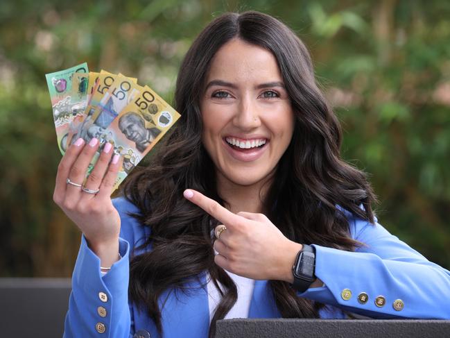 SMARTdaily national cover story about good Covid financial habits continuing as Australia opens back up. Teacher Adriana Trikolas 25, has saved more during the pandemic and expects to continue to save but will splurge a bit too to help out struggling small businesses.                     Picture: David Caird