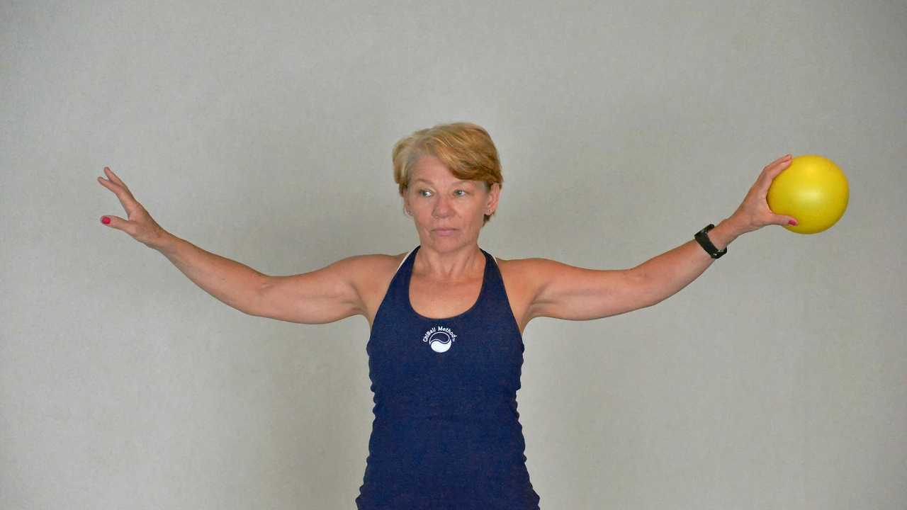 Sandy Salsibury during a chi ball work out. Photo Madolyn Peters / Daily Mercury. Picture: Madolyn Peters