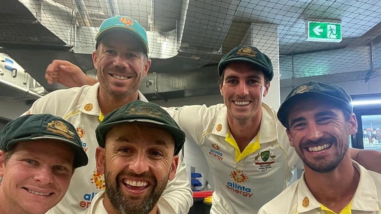 David Warner and Pat Cummins with teammates in Hobart.