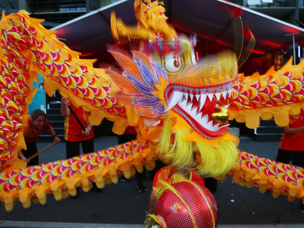 The CADCAI dragon dancers perform at the Cairns and District Chinese Association Inc Chinese New Year street festival on Grafton Street. PICTURE: BRENDAN RADKE