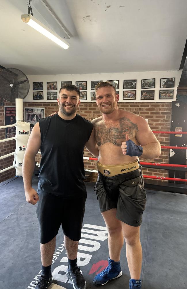 Tyson Jackson and Lodge after a rough sparring session.