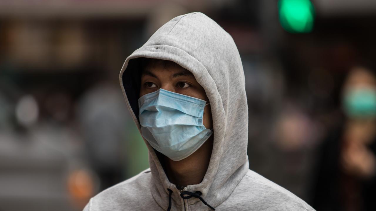 China’s national death toll from the virus rose by 97 to 908 on Sunday. Picture: Dale De La Rey/AFP