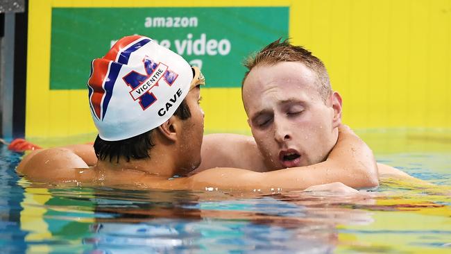 Daniel Cave comforts a distraught Matthew Wilson after the 200m breaststroke final at the Olympic trials. Picture: Getty Images