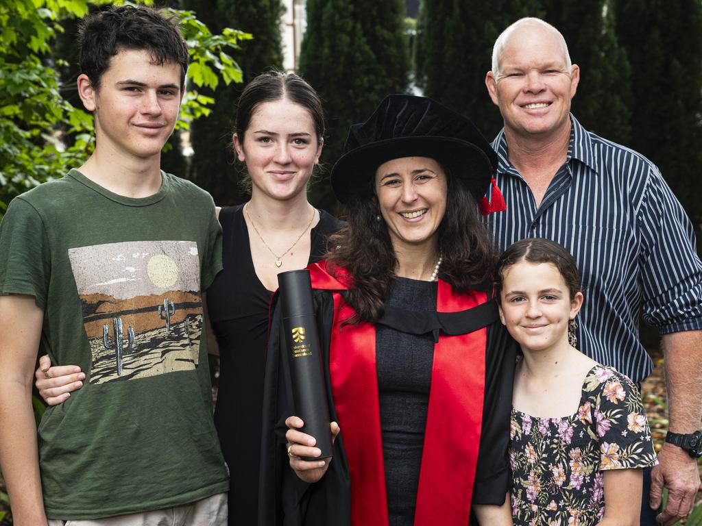 PhD graduate Aurelie Quade with kids (from left) Leo, Automne and Cevennes Quade and partner Justin Sutherland at a UniSQ graduation ceremony at The Empire, Wednesday, October 30, 2024. Picture: Kevin Farmer