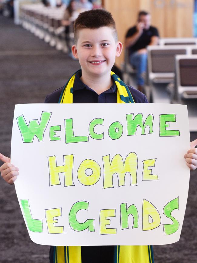 Leon,9, cousin of South Australian Olympic cyclist Leigh Hoffman waits for his famous relative at Adelaide airport. Picture: NewsWire / Brenton Edwards