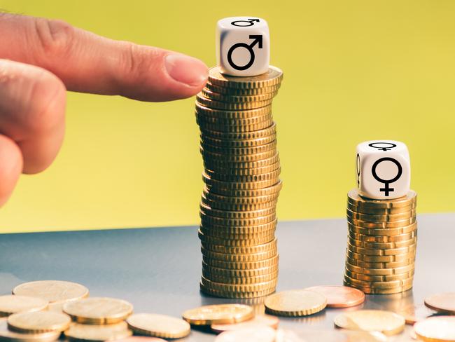 Symbol for unequal payment. Gender symbols on different high stacks of coins. Gender pay gap. Gender inequality. Pay inequality. Picture: iStock